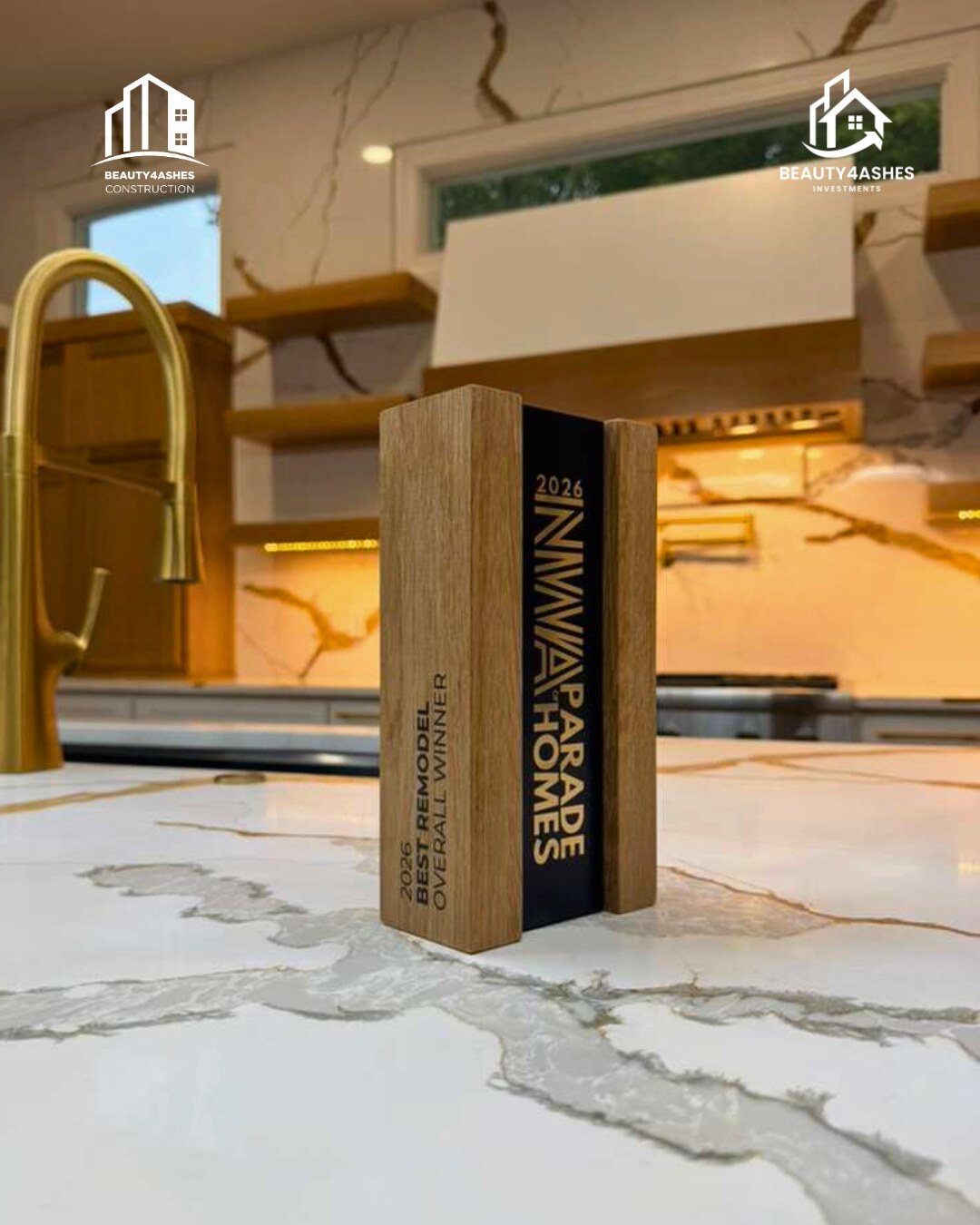 The 2026 NWA Parade of Homes Best Remodel Overall Winner trophy on the kitchen countertop
